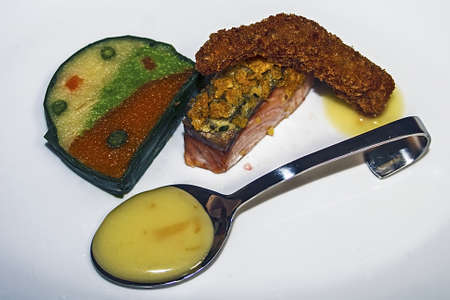 Arrangement cooking with different varieties of fish and fruitの写真素材