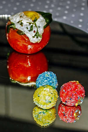Arrangement cooking with different varieties of vegetable, egg and sweets の写真素材