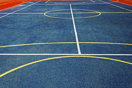 Sports field with synthetic turf and different markings, used in sports