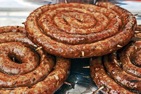 Fried sausages roll, secure with wooden rodsの写真素材