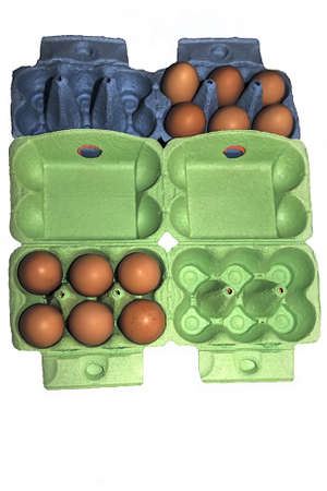 Twelve eggs arranged in a green and blue cartonの写真素材