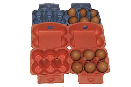 Twelve eggs arranged in a red and blue cartonの写真素材
