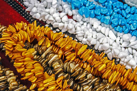 Different colored trinkets displayed in the waiting customers の写真素材