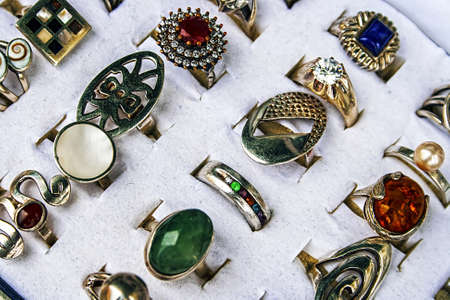 Different colored trinkets displayed in the waiting customers の写真素材