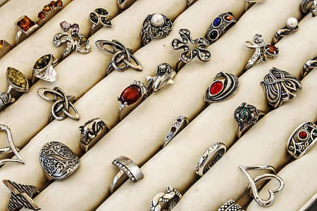 Different colored trinkets displayed in the waiting customers の写真素材