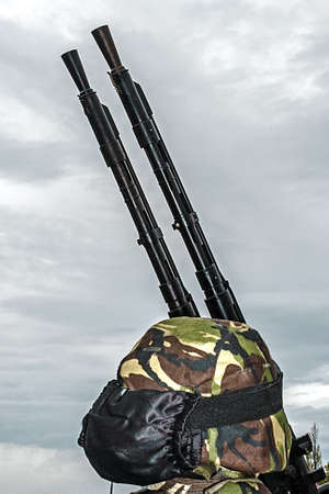 Soldier in action, watching the sky with arms   Army Day parade の写真素材
