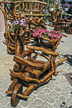 Garden furniture, made of branches and tree trunks, finished and varnished の写真素材