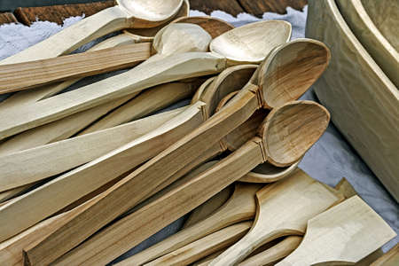 Handmade wooden spoons and exposed in bulk の写真素材