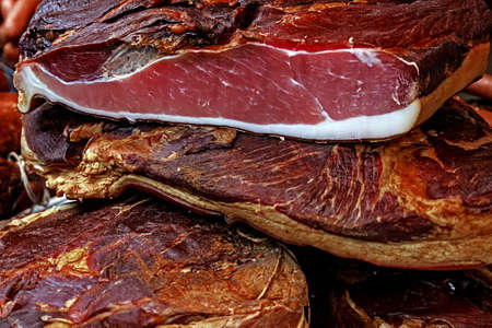 Pieces of smoked pork bacon overlapping Traditional Romanian food, shall specify in the month of December の写真素材