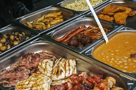 Different dishes, placed in vessels to be served.の写真素材