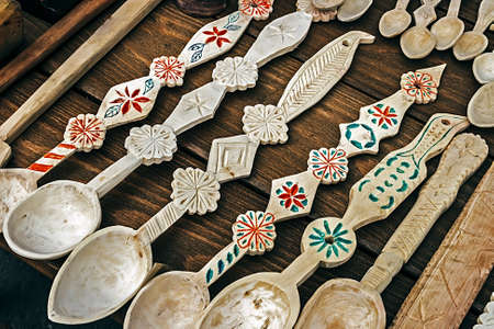 Wooden spoons carved with traditional motifs Romanian.の写真素材