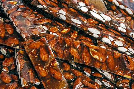 Hazelnut caramel bars exposed in bulk for sale  Homemade sweets の写真素材