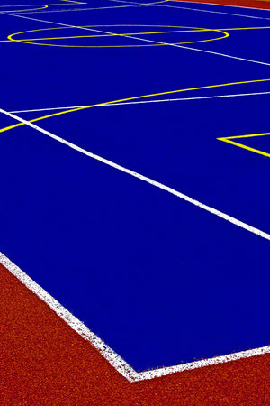 Sports field with synthetic turf and different markings, used in sports 