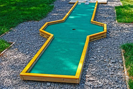 Small golf course built for children in a recreational space の写真素材