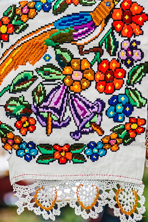 Materials and embroidered Romanian traditional port specific 