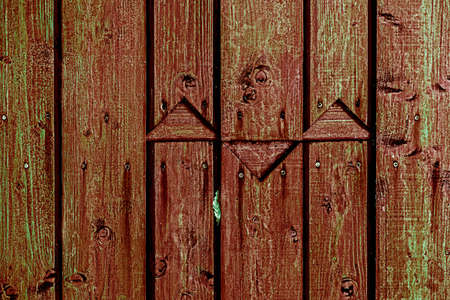 Texture of wall made of planks with paint peeling offの写真素材