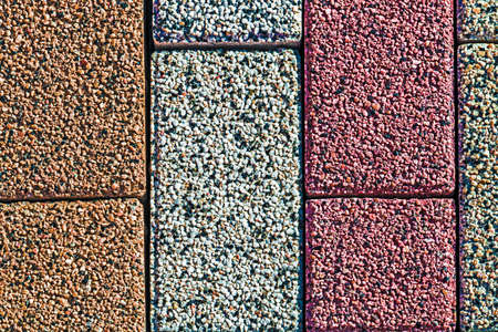 Detail of cobblestone sidewalk made of cubic stones.の写真素材