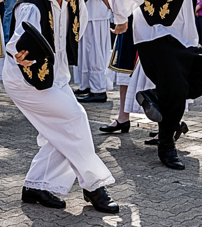 Dancers who perform, with the legs, specific movements of a Serbian dance.の写真素材
