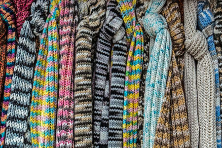 Wool scarves of various colors, exposed for sale.の写真素材