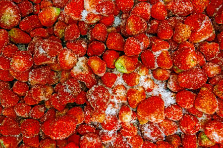 Abstract background with the appetizing frozen strawberryの写真素材
