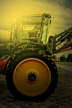 Agricultural equipment in sunset light. Image digitally manipulated.の写真素材