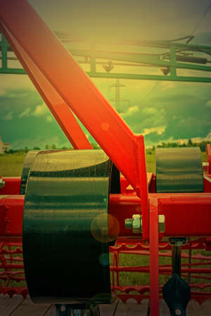 Agricultural equipment in sunset light. Image digitally manipulated.の写真素材