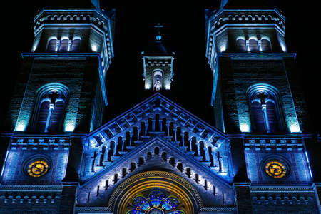 Various night lighting of the Roman-Catholic Cathedral Millenium located in Traian Square, Timisoara, Romania.の写真素材