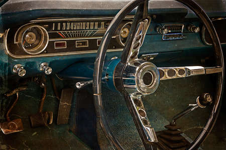Old postcard with driver's cockpit of a vintage classic car. Vintage processed.の写真素材