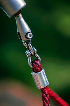 Detail for fixing to a hammock made of colored rope and connection system.の写真素材