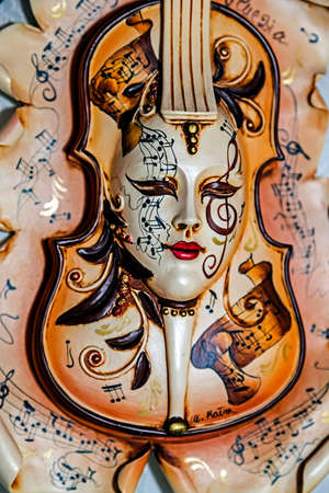 VENICE, ITALY - JANUARY 23, 2016: Typical colorful mask from the venice carnival, Venice, Italy, 2016.のeditorial素材