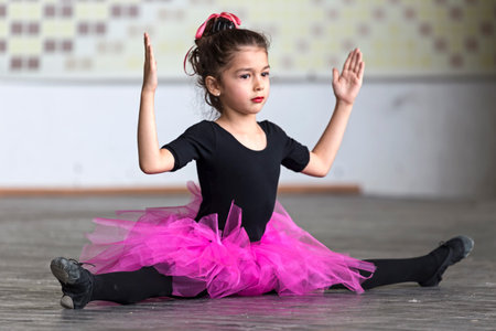 TIMISOARA, ROMANIA - JUNE 01, 2016: Young girl perform ballet positions in one show organized by...