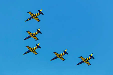 TIMISOARA, ROMANIA - MAY 21, 2016: Fighter jets in a local air show organised by the international airport Timisoara. Baltic Bees team.のeditorial素材