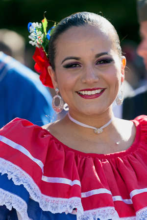 ROMANIA, TIMISOARA - JULY 7,2016:Young woman from Costa Rica in traditional costume, present at the international folk festival, "International Festival of hearts" organized by the City Hall Timisoaraのeditorial素材