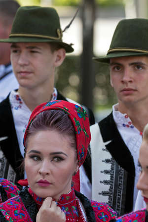 ROMANIA, TIMISOARA - JULY 7, 2016:Woman and men from Romania in traditional costume, present at the international folk festival, "International Festival of hearts" organized by the City Hall Timisoaraのeditorial素材