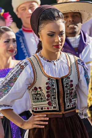 ROMANIA, TIMISOARA - JULY 7, 2016: Young Romanian dancer in traditional costume, present at the...