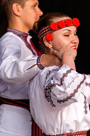 ROMANIA, TIMISOARA - JULY 9, 2016: Young Ukrainian dancers in traditional costume, present at the international folk festival, "International Festival of hearts" organized by the City Hall Timisoara.のeditorial素材