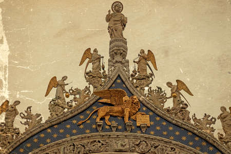 Winged lion, symbol of Venice, Italy. Old postcard. Vintage processing.の写真素材