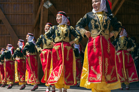 ROMANIA, TIMISOARA - JULY 10, 2016: Young Turkish dancers in traditional costume, present at the international folk festival, "International Festival of hearts" organized by the City Hall Timisoara.のeditorial素材