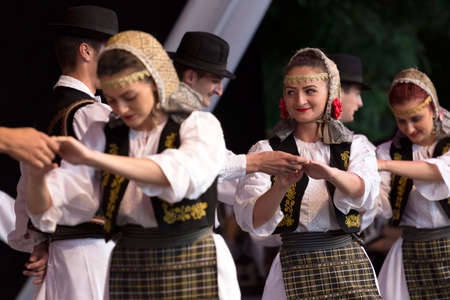 ROMANIA, TIMISOARA - JULY 7, 2016:Young dancers from Romania in traditional costume present at the international folk festival "International Festival of hearts" organized by the City Hall Timisoaraのeditorial素材