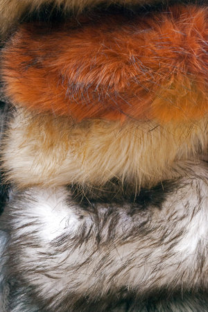 Background and texture of overlapping fur hats.