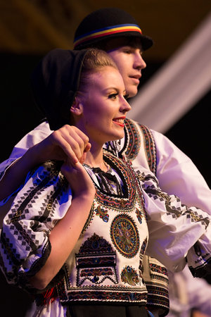 ROMANIA, TIMISOARA - JULY 7, 2016: Young dancers from Romania in traditional costume present at the...