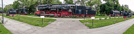 RESITA, ROMANIA - JUNE 21, 2016: Panoramic view of the steam locomotive park in Resita, Romania.のeditorial素材