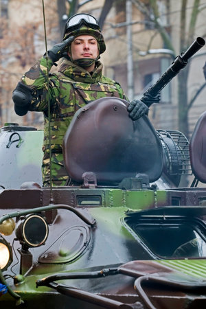 TIMISOARA, ROMANIA - DECEMBER 1, 2016: Military parade at Romanian National Day. Soldier in an...