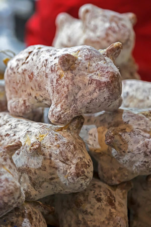 Italian traditional sausages, in form of pig, overlapping in bulk.