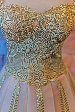 Detail of a wedding dress decorated with crystals, lace and veils.の写真素材