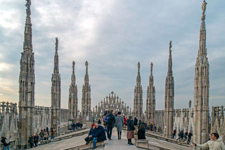 MILAN, ITALY - DECEMBER 11, 2016: Tourists on the roof of Duomo Cathedral in Milan, Italy.のeditorial素材