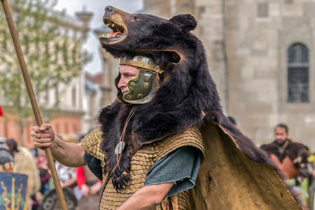 ALBA IULIA, ROMANIA - APRIL 29, 2017: Roman soldier in battle costume, present at APULUM ROMAN FESTIVAL, organized by the City Hall.のeditorial素材