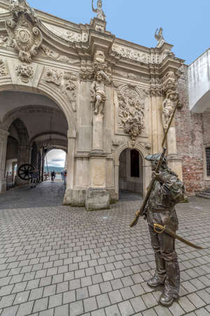 ALBA IULIA, Romania - APRIL 30, 2017: Bronze statue with soldier in front of Third Gate of the City in Citadel of Alba Iulia city.のeditorial素材