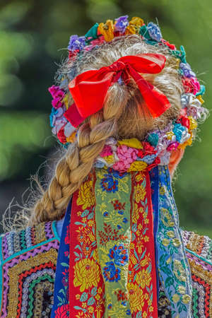 Detail of Polish folk costume for woman with multicolored embroidery.の写真素材