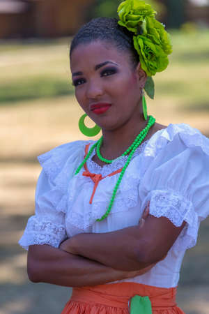 TIMISOARA, ROMANIA - JULY 9, 2017: Young dancer girl from Puerto Rico in traditional costume present at the international folk festival "International Festival of hearts" organized by the City Hall.のeditorial素材